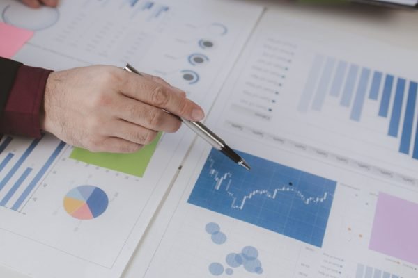 Business man group are meeting together in the office, they are meeting on the topic of finance and financial management, they are business partners. Concept financial management for startup companies